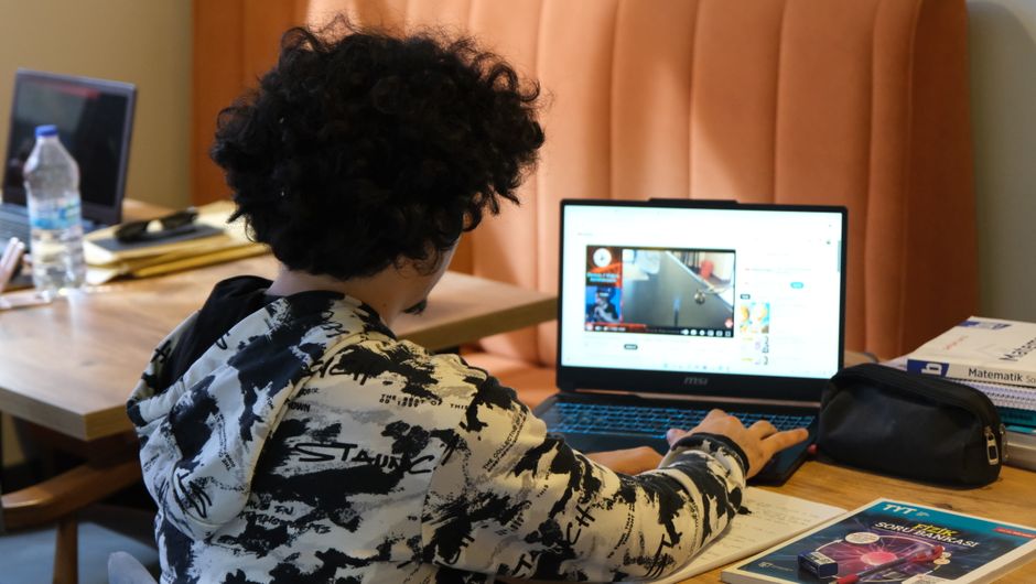 teenager studying desk